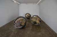 Majid Biglari, “Earth”, from “The Experience of Dishevelment” series, three-piece installation, mixed media (iron, used military textiles, glue, etc.), each 100 x 100 x 100 cm, unique edition, 2016